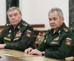 1493422-a-gauche-le-general-guerassimov-et-a-droite-le-ministre-de-la-defense-russe-serguei-choigou-le-27-fevrier-2022.jpg